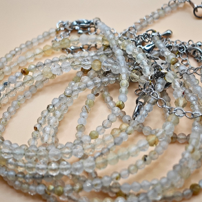 Guldrutil Kvarts Armb�nd � Facetslebet