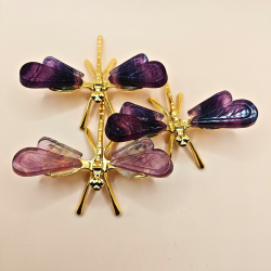 Dekorative Guldsmede med Fluoritvinger 