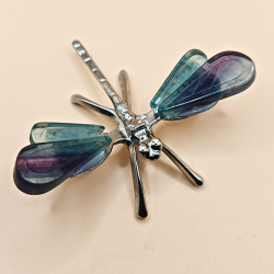 Guldsmed med fluorit vinger